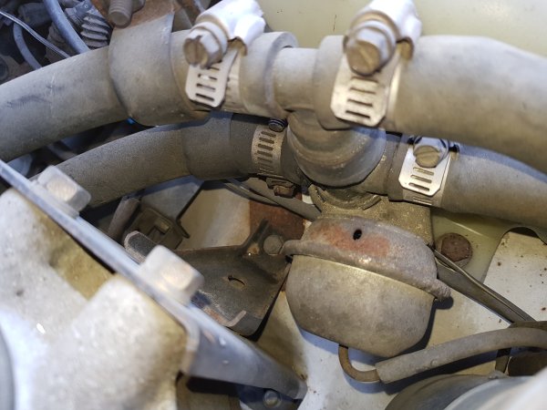 Vacuum water control valve for rear heater